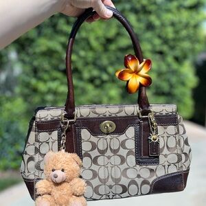 SOLD
Coach Brown Hampton purse with Teddy Bear Charm